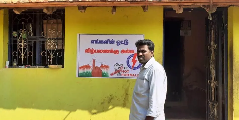  Our vote is not for sale ... poster sticking youngsters on the home wall